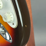 Wear on side of Used 1984 Fender America STD Strat Sunburst.