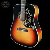Front angle of Gibson Custom Made 2 Measure Hummingbird Maple Long Scale Tri-burst LR Baggs VTC.