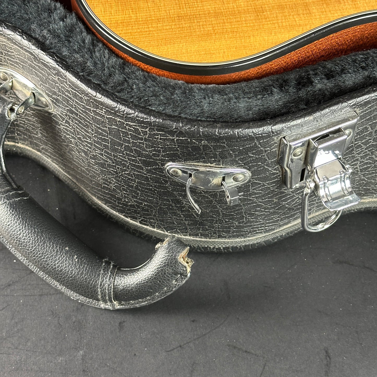 Broken handle on case for Used 2010 Taylor 314ce X-Braced.