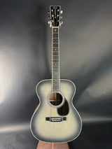 Acoustic guitar on a gray background