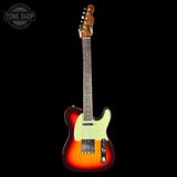 A classic Fender Telecaster electric guitar with a sunburst finish, featuring a cream pickguard and maple neck, shown against a solid black background with a Tone Shop watermark in the top left corner.