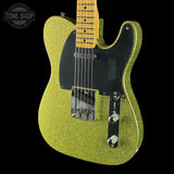 Front angle of Fender Custom Shop TSG Exclusive ’52 Telecaster Chambered Chartreuse Sparkle Journeyman Relic.