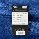 PRS Guitars label on a blue textured background