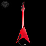 A red electric guitar shown from the back against a solid black background, featuring a distinctive angular body shape and a glossy red finish.