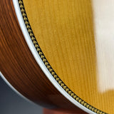 Wear in binding of Used 2008 Martin Custom 000 Adirondack/EIR.