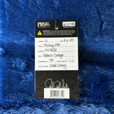 PRS guitar label on a blue textured background