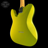 A close-up of the back of a bright yellow-green electric guitar body with a maple neck, shown against a black background. A Tone Shop watermark is visible in the top-left corner.