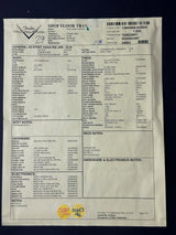Document with text and checkboxes on a dark background