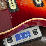 Powers Electric A-Type Select Washed Cherry / Garnet Red on scale displaying weight.