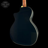 The back of a glossy black electric acoustic guitar with a brown neck, shown against a solid black background. A 'TONE SHOP' watermark is visible in the top-left corner.