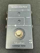 Moollon System Interface guitar effects pedal on a dark background