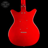 The rear view of a red electric guitar body with chrome hardware, photographed against a solid black background. A 'TONE SHOP' watermark is visible in the top-left corner.