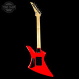 A red electric guitar with a distinctive angular body, shown from the back against a solid black background. The neck is made of natural light wood, and a Tone Shop watermark is visible in the top-left corner.