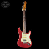 A red glitter electric guitar with a cream pickguard and maple neck, shown against a solid black background with a Tone Shop watermark in the top-left corner.