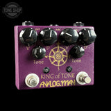 Analog Man King of Tone overdrive guitar pedal in purple with black knobs and gold lettering, shown on a black background.