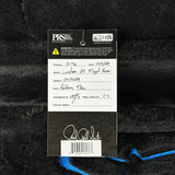 PRS guitar label with model details on a textured black background