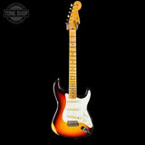 Electric guitar with sunburst finish on a black background, featuring 'Tone Shop' logo.