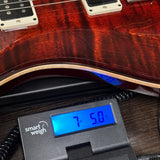 Used 2018 PRS Custom 22 Red Burst on scale displaying weight.