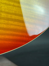 Close-up of a wooden surface with a gradient from yellow to red.
