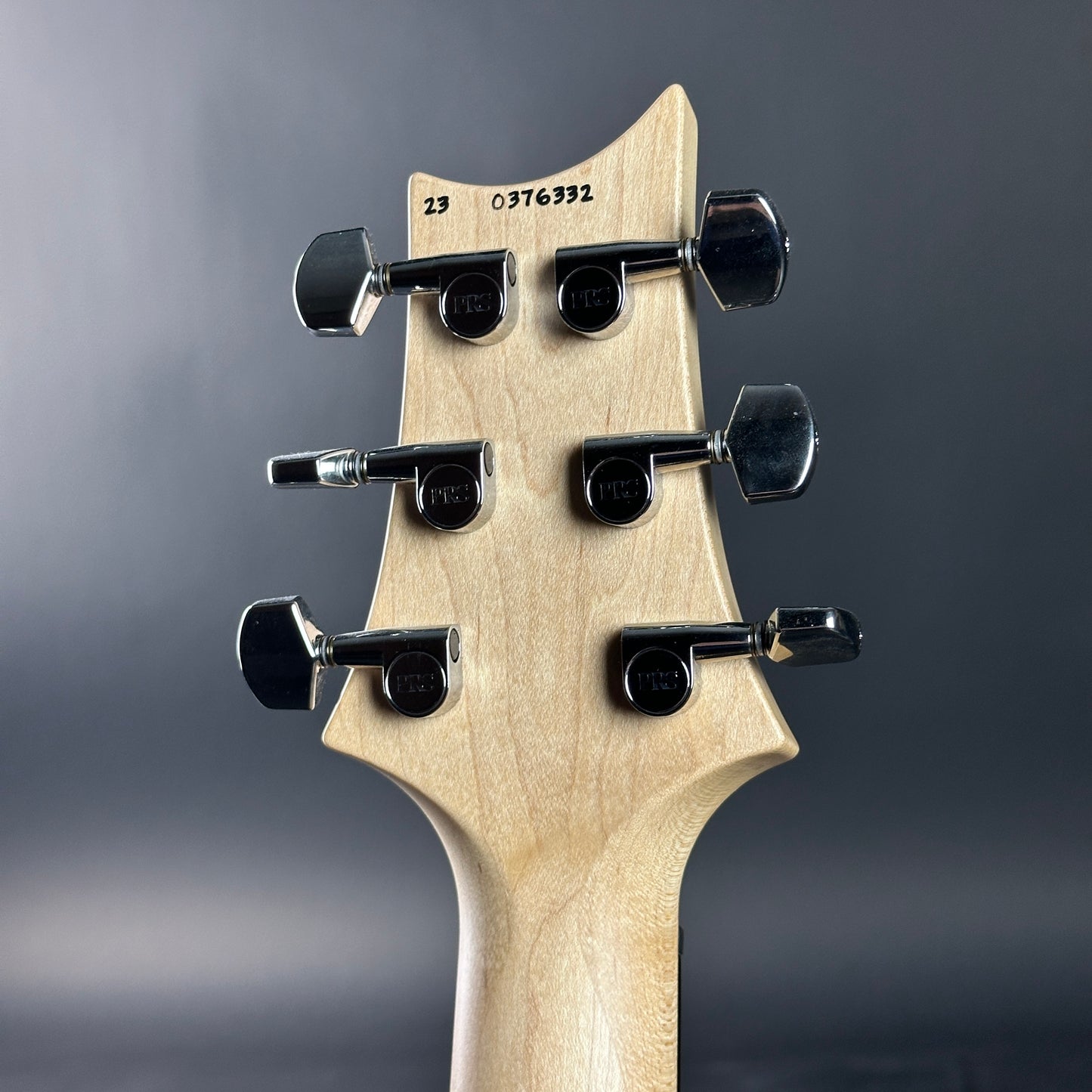Back of headstock of Used 2024 PRS CE-24 Semi-Hollow Eriza Verde.