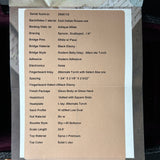 Technical specifications sheet for a guitar on a cardboard background