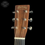 Guitar headstock with 'Martin & Co' branding on a black background
