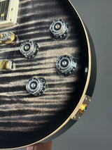 Front angle of Used 2024 PRS McCarty 594 10 Top Charcoal Burst.