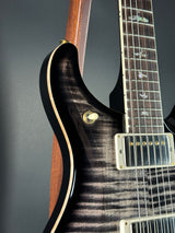 Front angle of Used 2024 PRS McCarty 594 10 Top Charcoal Burst.