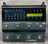 T.C. Electronic guitar effects pedal on a wooden surface