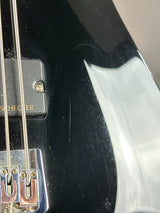 Wear on body of Used Schecter Omen-8 Left Handed Black.