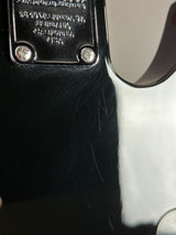 Scratches on back of Used Schecter Omen-8 Left Handed Black.