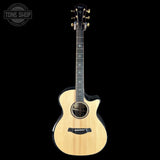 Taylor Builder's Edition 914ce Prototype Next Generation Acoustic guitar with a visible brand logo on a black background