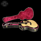 Taylor Builder's Edition 514ce Prototype Acoustic guitar in a black case with red interior on a black background, featuring 'Tone Shop' logo.