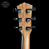 Taylor Gold Label 514e Prototype Sunburst Guitar headstock with tuning pegs on a black background, featuring the Taylor logo.