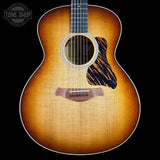 Taylor Gold Label 514e Prototype Sunburst Acoustic guitar with a sunburst finish on a black background, featuring the Tone Shop logo.