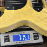 Used 2007 Gibson Custom Shop 1958 Les Paul Jr TV Yellow on scale displaying weight.