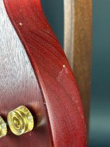 Wear on side of Used 2009 Gibson Les Paul Studio Faded Cherry Red.