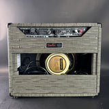 Fender guitar amplifier with Celestion speaker on a gray background