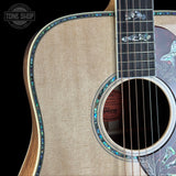 Front detail of Gibson Hummingbird Custom Koa Antique Natural.