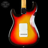 Electric guitar body with sunburst finish on a black background, featuring the Tone Shop logo.