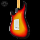 Guitar body with sunburst finish on a black background, featuring 'Tone Shop' logo.