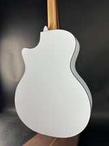 White electric guitar on a dark background