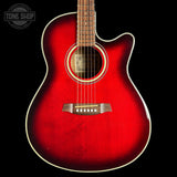 A red acoustic-electric guitar with a cutaway body, shown from the front against a black background. The brand name 'Tone Shop' is visible as a watermark in the top-left corner.