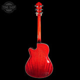 A red electric acoustic guitar shown from the back against a solid black background, featuring a glossy cherry-red finish and silver tuning keys.