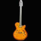 Wooden guitar with a metallic neck against a gray background