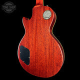 Gibson electric guitar body with brand logo on a black background