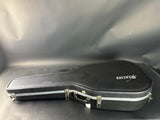 Black guitar case with a brand logo on a gray background