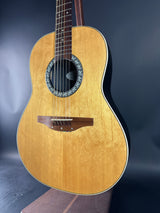 Acoustic guitar with a dark background