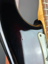 Wear on body of Used 2020 Fender American Ultra Stratocaster Ultraburst.