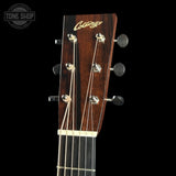 Collings guitar headstock with brand name on a black background